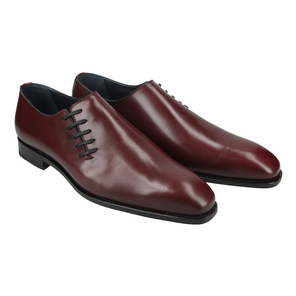 Bordeaux red Oxford dress shoes in polished full-grain leather with closed lacing and sleek toe, perfect for weddings and formal events