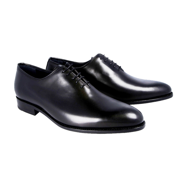 Black whole-cut Oxford shoes in full-grain Italian leather with Goodyear welt, handcrafted in Portugal for timeless elegance and formal style.