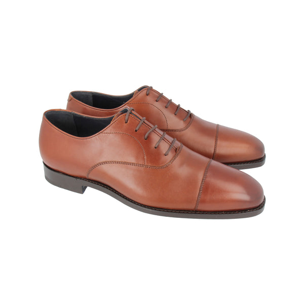 Chestnut brown cap-toe Oxford shoes in full-grain leather with Goodyear welt, handcrafted in Portugal for timeless style and lasting comfort.