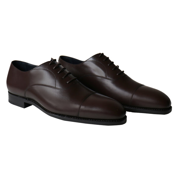 Chocolate brown Oxford shoes in full-grain leather with cap toe design and Goodyear welt, handcrafted in Portugal.