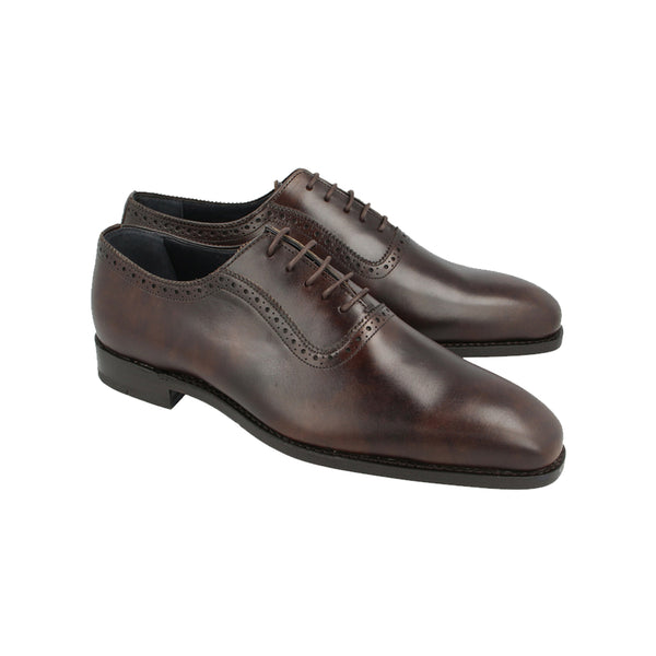 Dark brown Museum Calf Oxford shoes with subtle brogue accents in marbled leather, Goodyear welted and handcrafted in Portugal for classic style