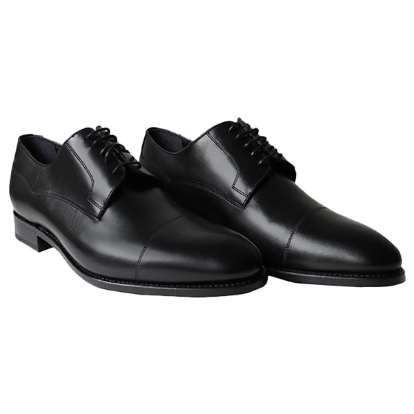 Sleek black full-grain Italian leather derby shoes with cap-toe design, Goodyear welted and handcrafted for timeless elegance.