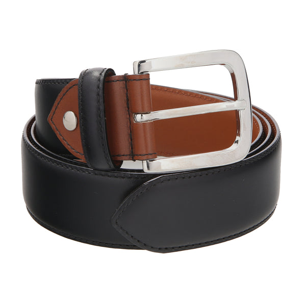 Handmade black leather belt with brown lining and stainless steel buckle, crafted in Spain for timeless style and durability.
