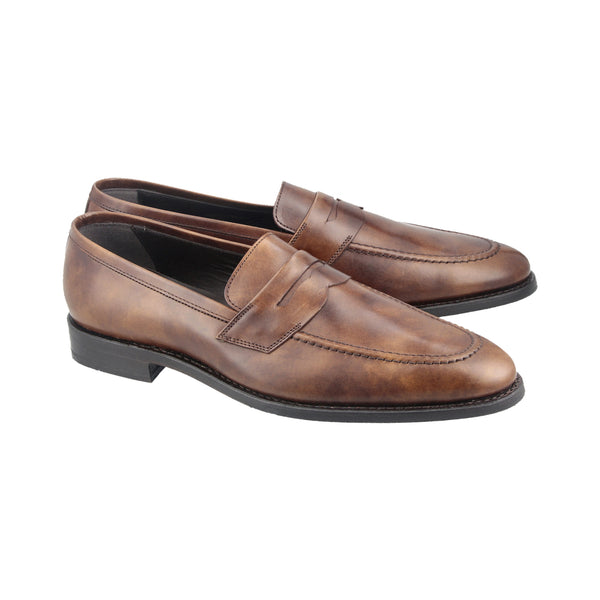 Brown Museum Calf leather penny loafers with round toe design and Goodyear welt, handcrafted in Portugal for refined comfort and style.