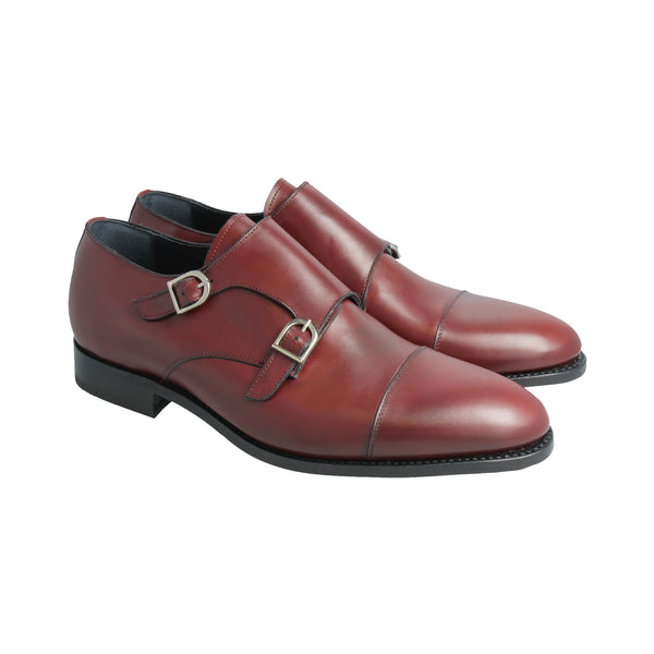 Bordeaux double monk strap shoes in full-grain Italian leather with cap toe, Goodyear welted and handcrafted in Portugal for bold elegance.