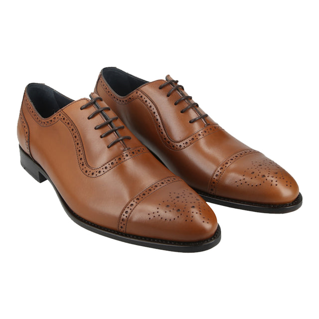 the classic design and warm tan hue efforlessly compliment any  formal or casual ensemble.