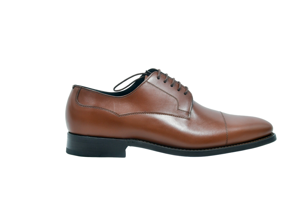 Astor in Chestnut brown Weinheimer leather derby shoes with classic cap-toe design, Goodyear welted and handcrafted for refined style.