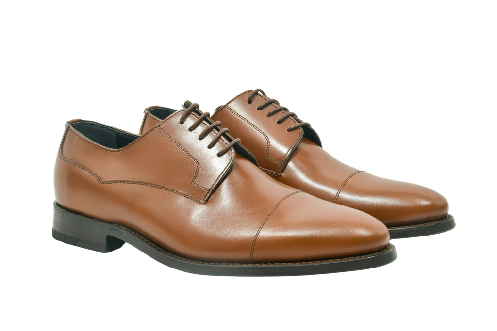 Chestnut brown Weinheimer leather derby shoes with classic cap-toe design, Goodyear welted and handcrafted for refined style.