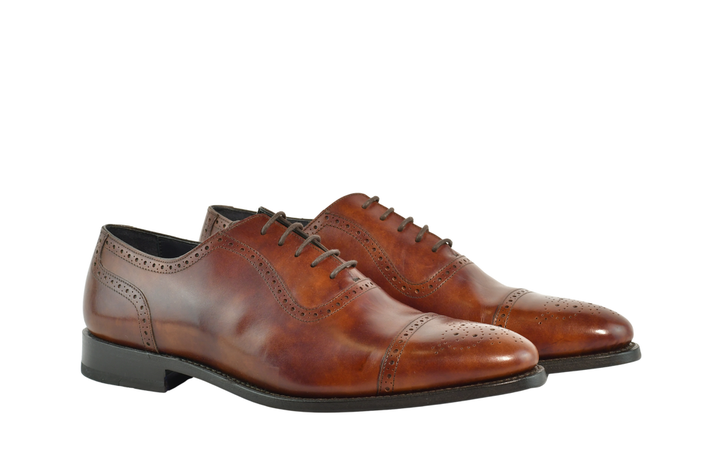 Museum Calf Bracklen Oxford shoes in rich brown leather with brogue detailing and Goodyear welt, handcrafted in Portugal for classic style. 