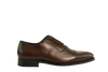 Chocolate brown Oxford shoes with brogue cap-toe design in full-grain leather, Goodyear welted and handcrafted in Portugal for classic elegance.