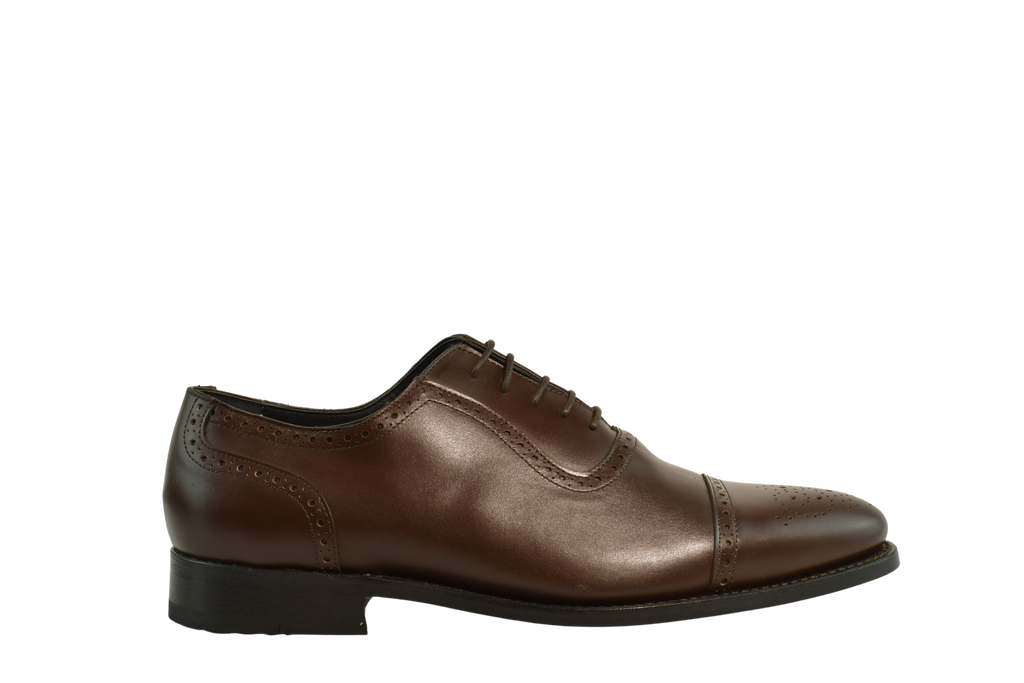 Chocolate brown Oxford shoes with brogue cap-toe design in full-grain leather, Goodyear welted and handcrafted in Portugal for classic elegance.