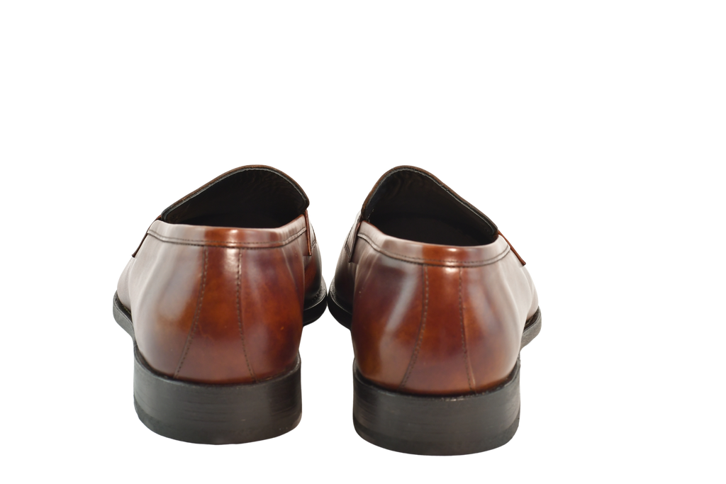 Manhatten in museum Calf Bracklen penny loafers in rich reddish-brown leather, Goodyear welted and handcrafted in Portugal with round toe and blue soles.